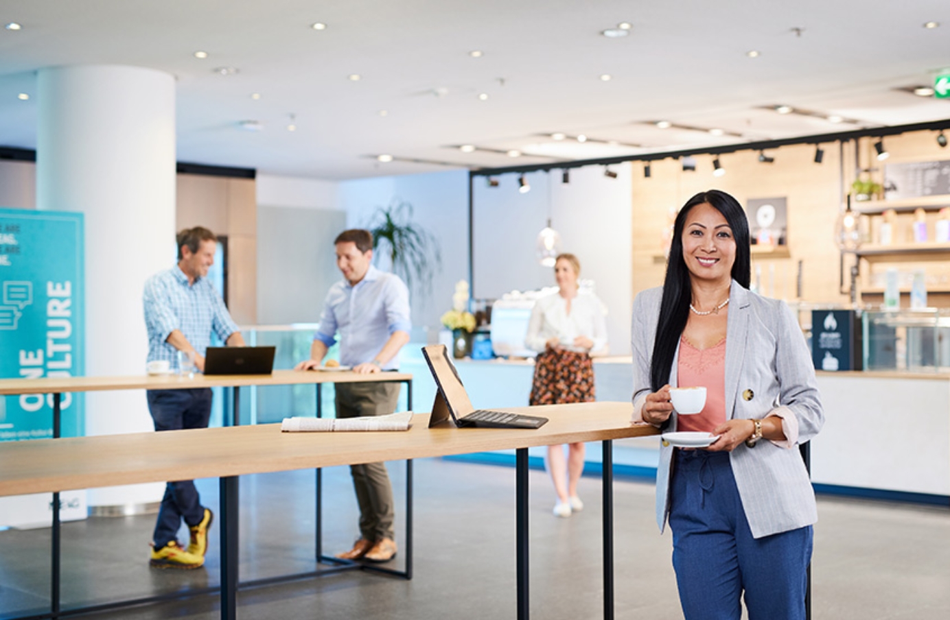 People in a modern office cafe