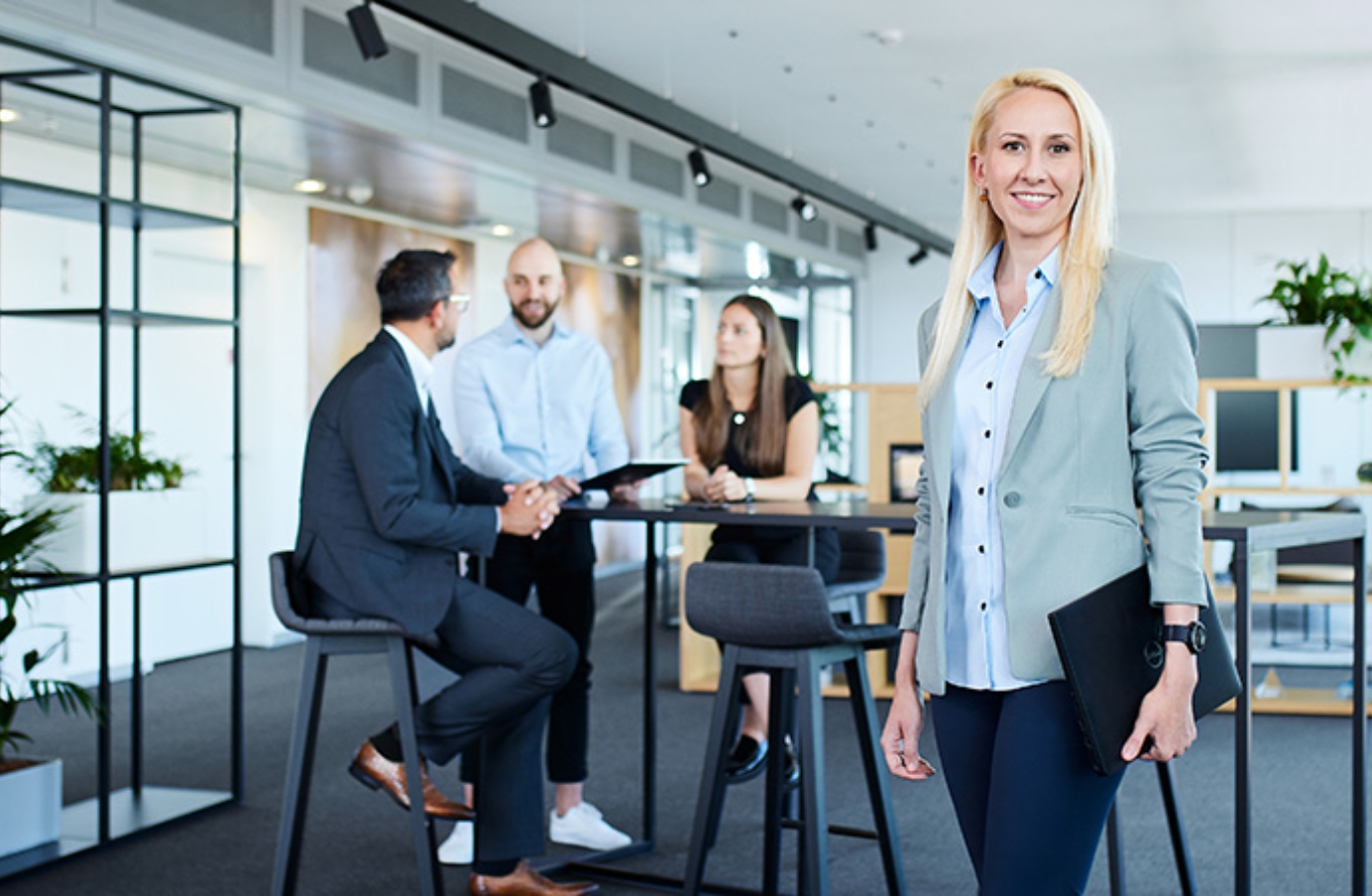 People collaborating in workspace.