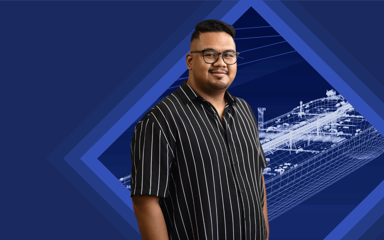 Man in black and white shirt on blue background.