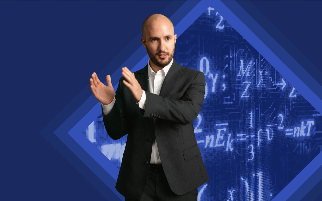 Man in suit claps with math signs behind.