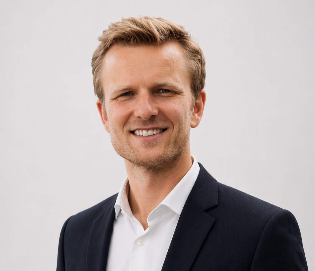 Man smiling into the camera.