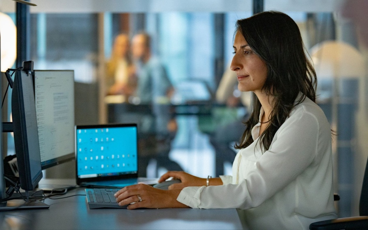 Woman looking at laptop