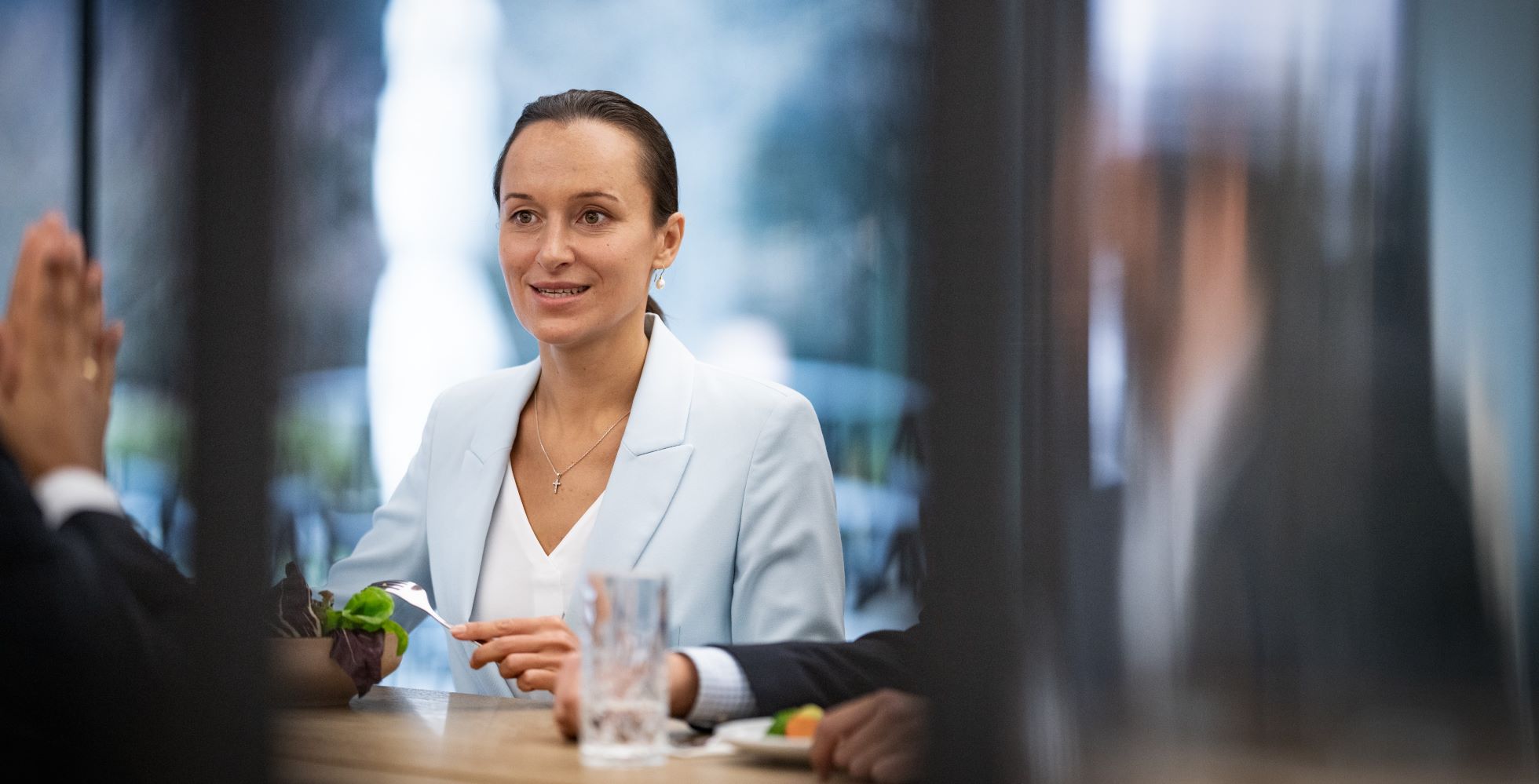 Young woman smiling into the camera.