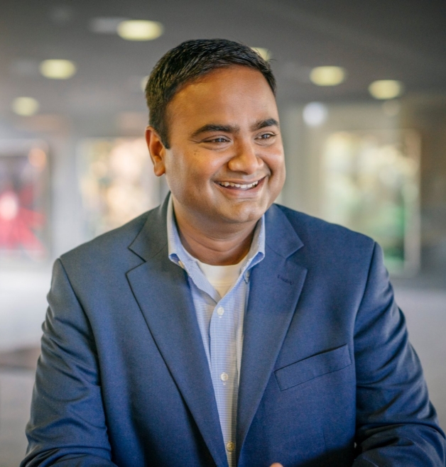 Employee image - Srinivas in formal wear.