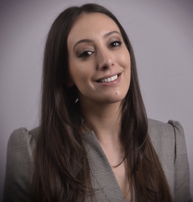 Employee image – Amanda in grey blazer.