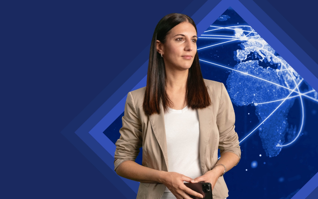 Woman with phone and digital globe.