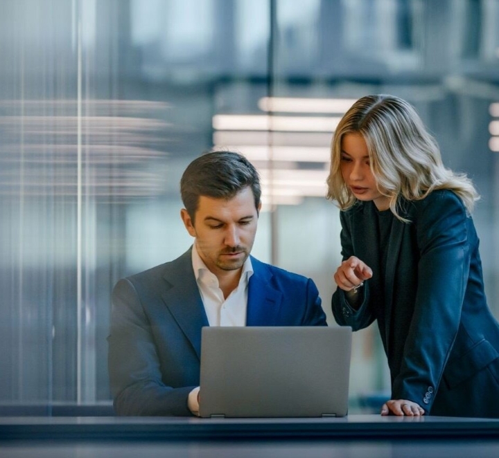 Man and woman with laptop