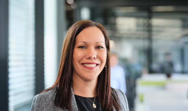 Smiling professional woman in modern office