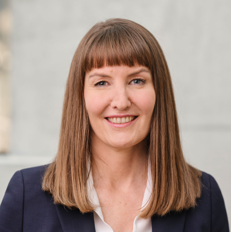 Smiling woman in business attire portrait