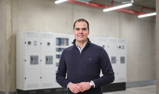 Professional man standing in industrial facility