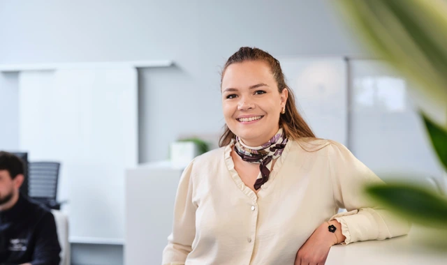 Smiling professional woman in office