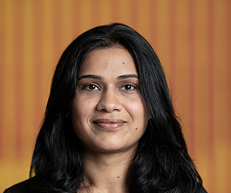 Woman with black hair in black top