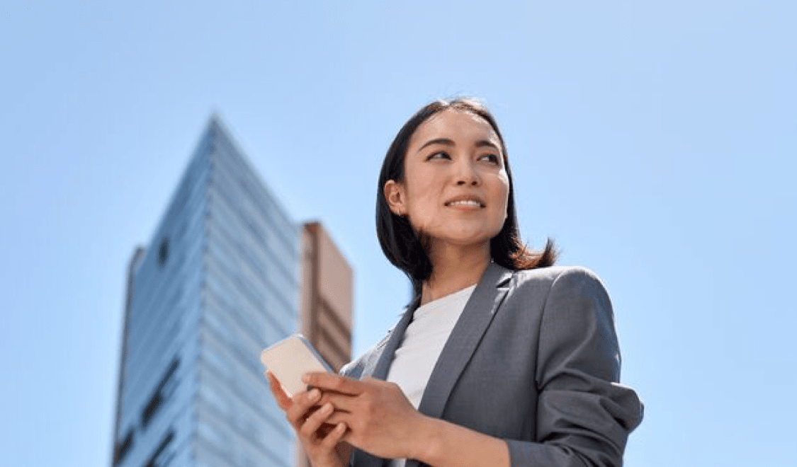 Women outside office on her phone