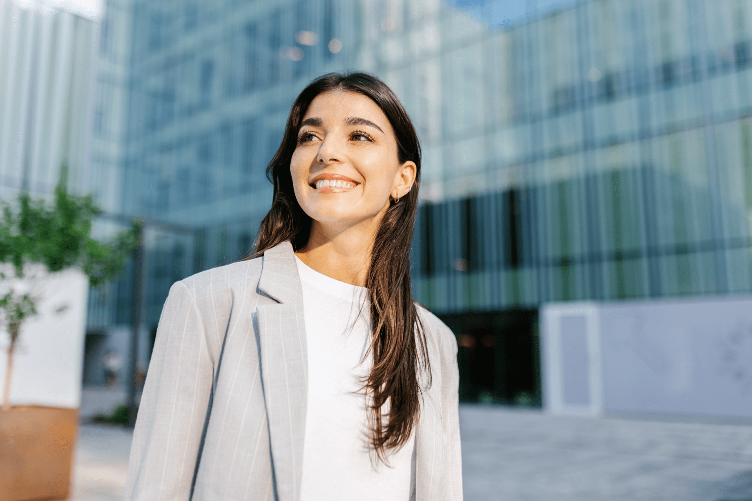 Woman in hijab smiling at camera
