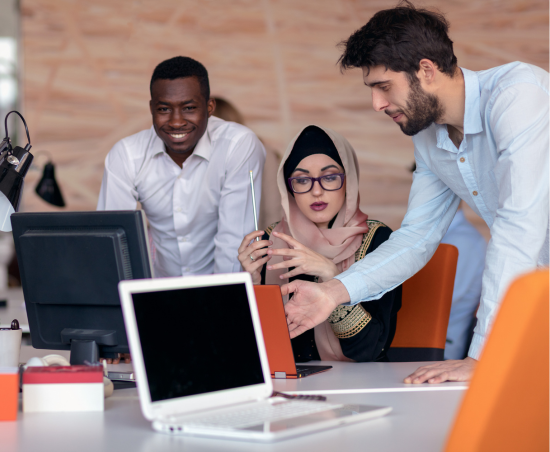 Colleagues collaborating in an office environment.