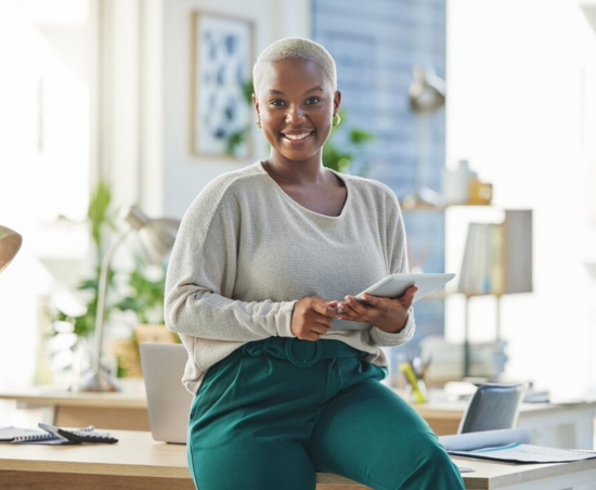 A professional working in an office setting during a typical working day.