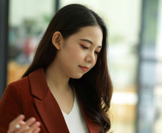 A professional working in an office setting during a typical working day.