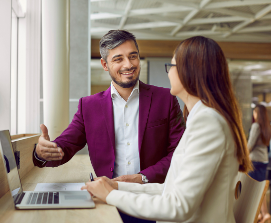 Professionals collaborating during a work discussion.