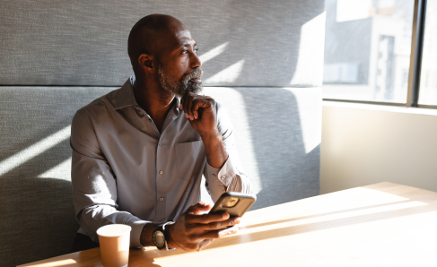 A professional working in an office setting during a typical working day.