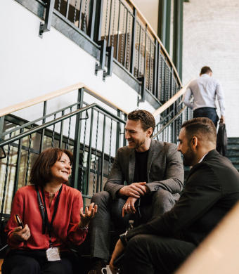 Colleagues collaborating in an office environment.