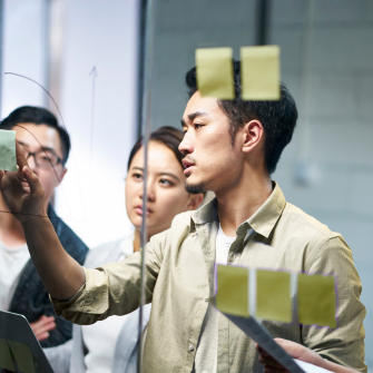 Colleagues collaborating in an office environment.