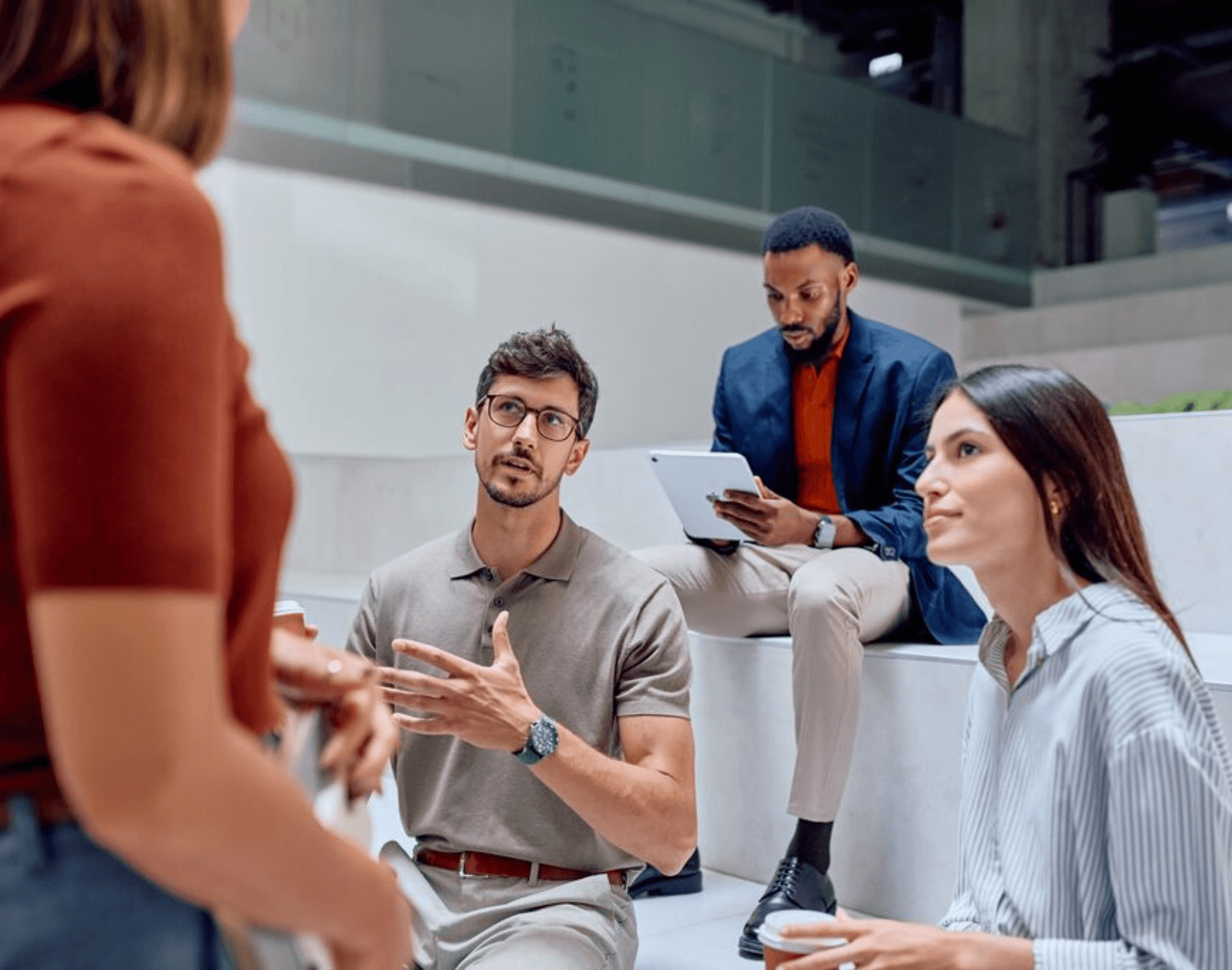 Colleagues collaborating in an office environment.