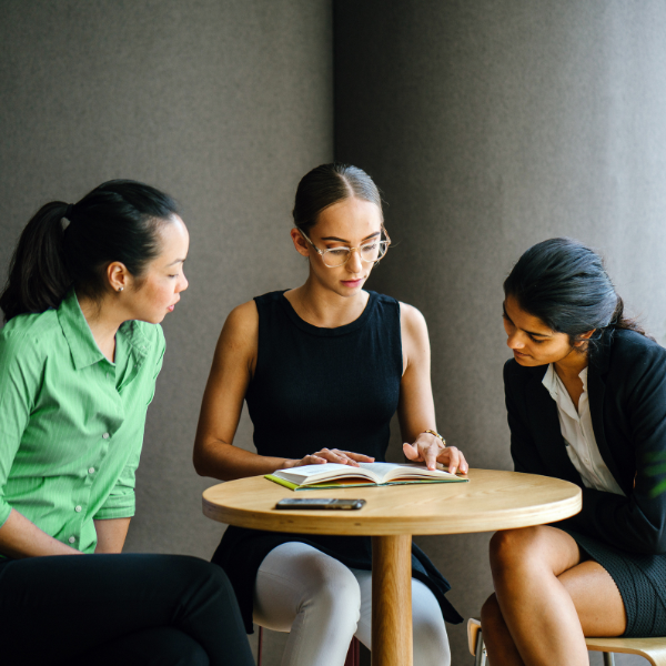 Colleagues collaborating in an office environment.