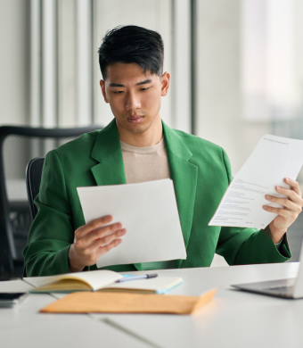 A professional working in an office setting during a typical working day.