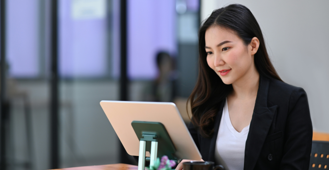 A professional working in an office setting during a typical working day.