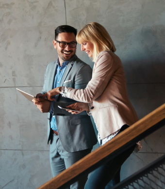 Two colleagues collaborating in an office setting.