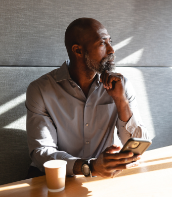 A professional working in an office setting during a typical working day.