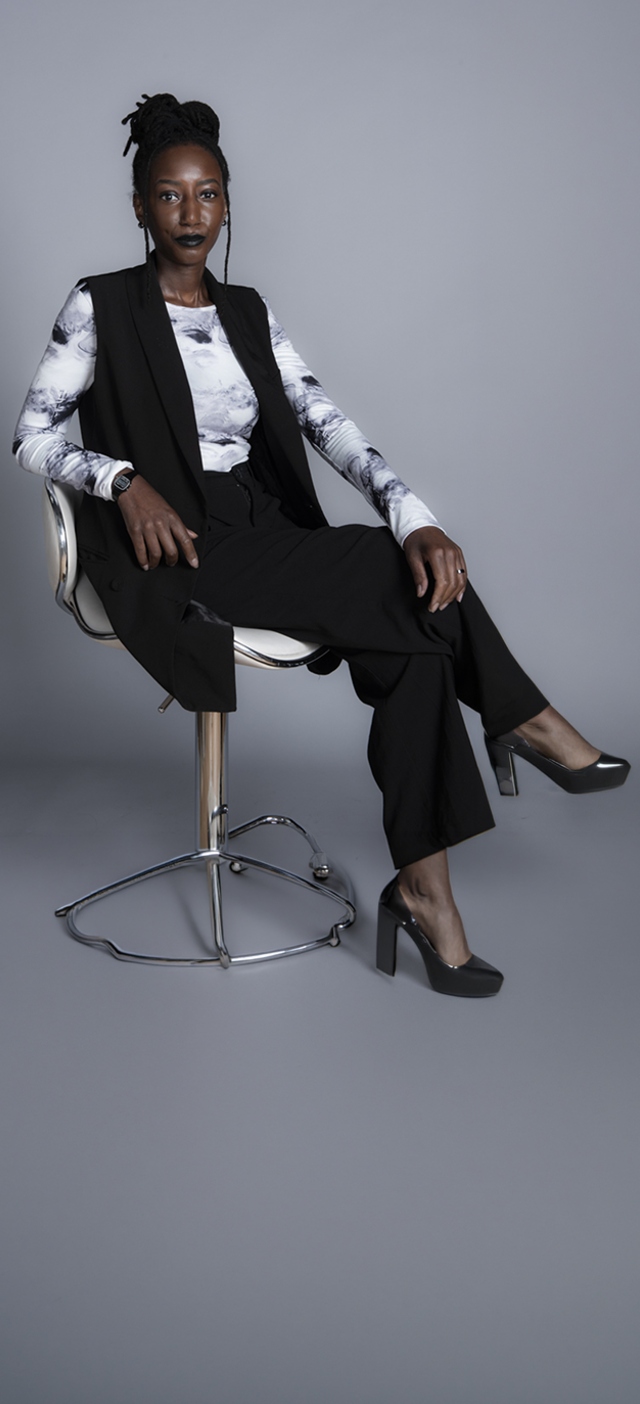 Professional seated in studio portrait