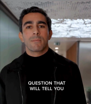 Person speaking in a hallway video interview
