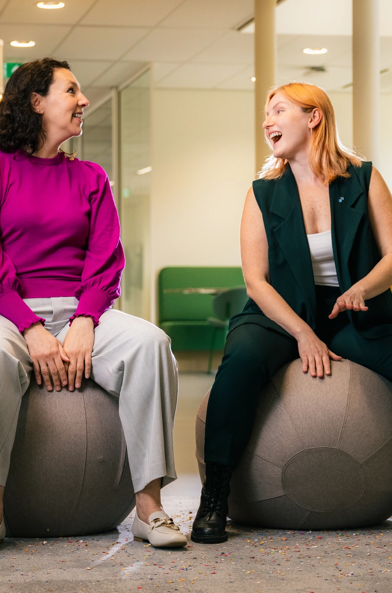 women confidently smiling