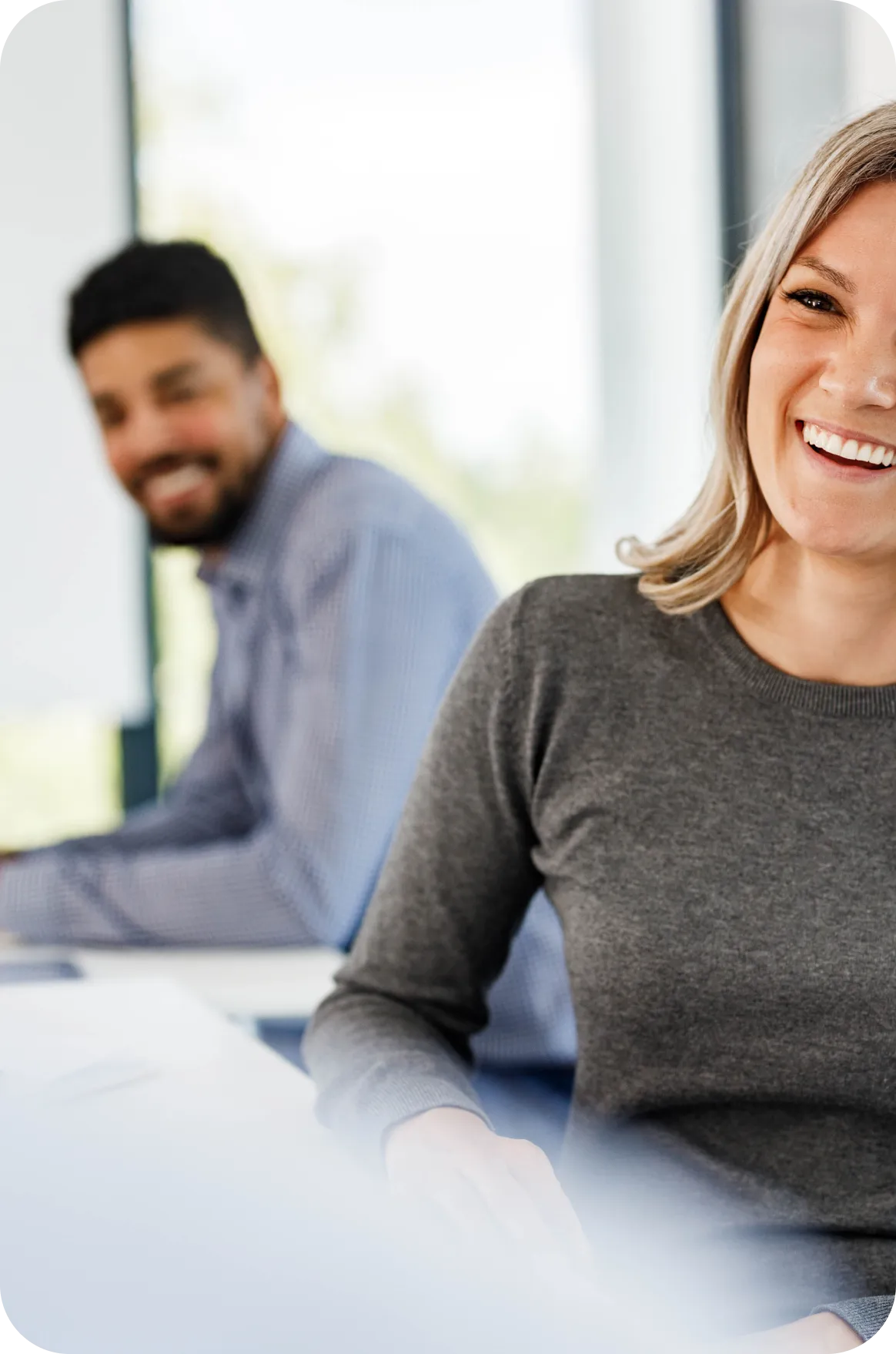 Professionals working together in modern office setting