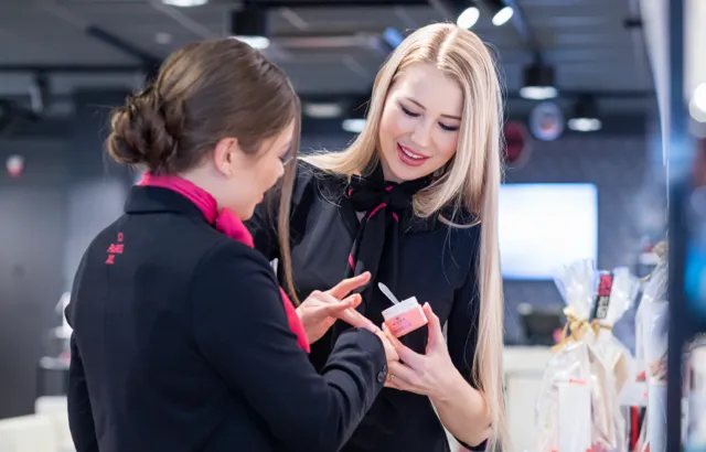Staff discussing cosmetic product